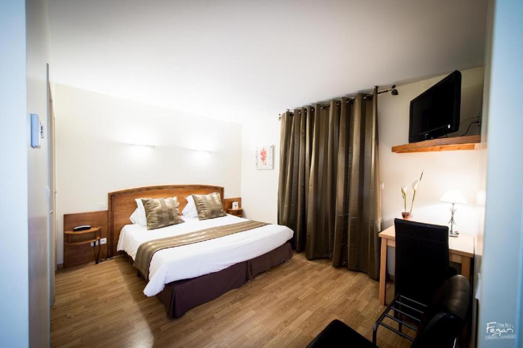 Hotel Le Lion D'Or แซงต์-เชอนีส-ดอลต์ ห้อง รูปภาพ